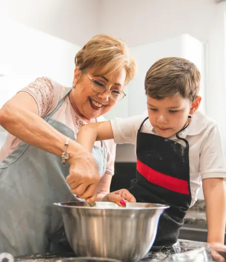Teaching a child how to cook a dish