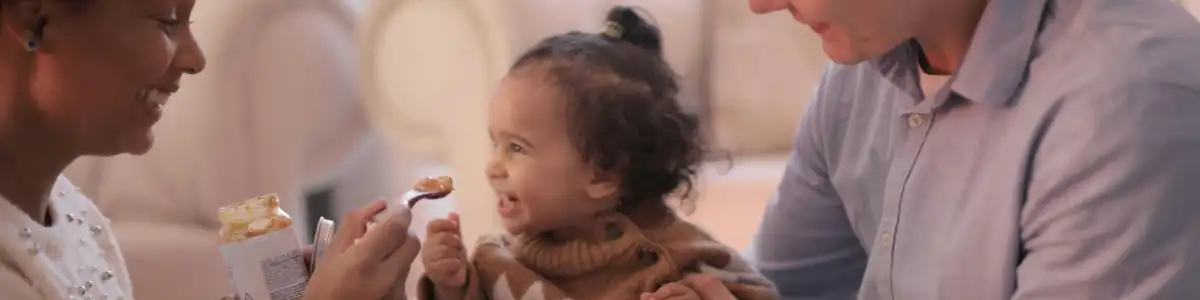 Child smiling at foster parent